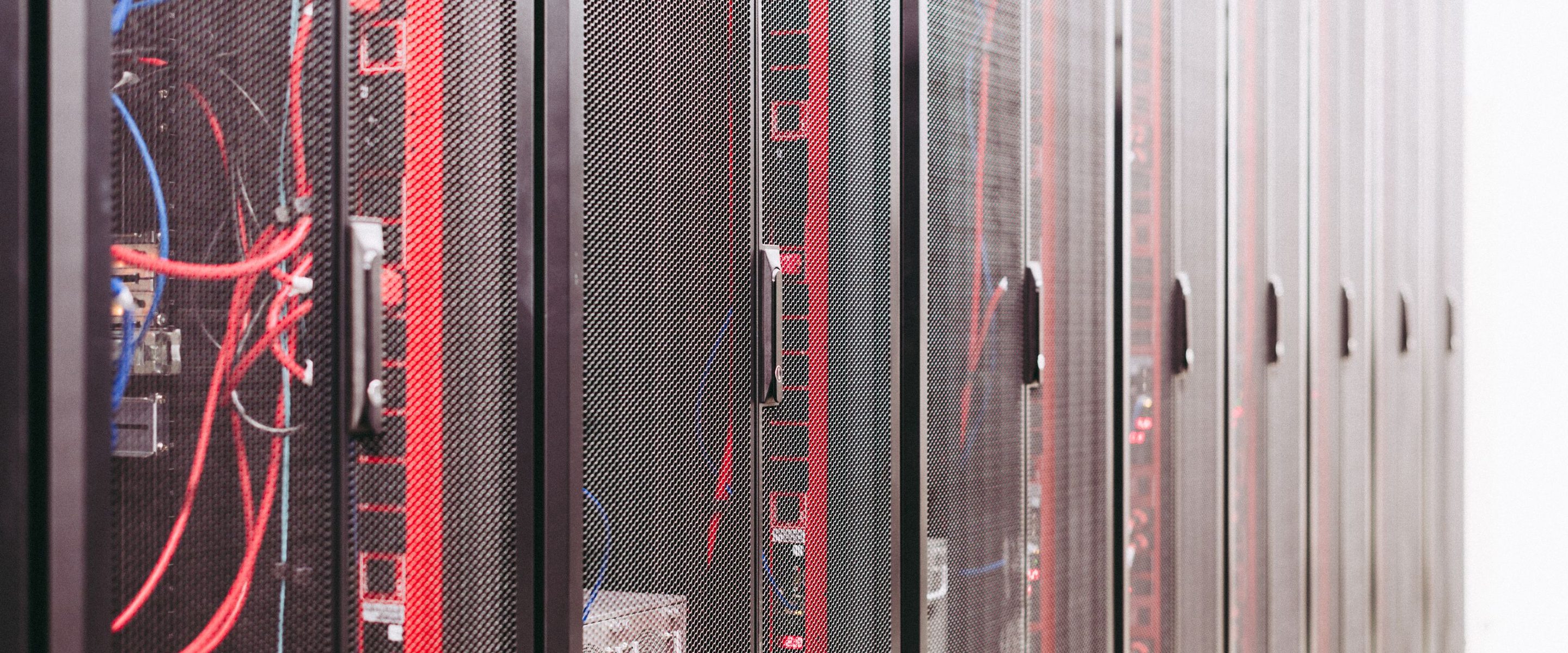 A row of racks photographed down a data hall during an inventory sweep
